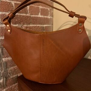 Portland Leather Brown Hobo Bag with Crescent Shape and Textured Leather